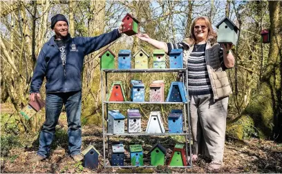  ??  ?? Paul Thornton and Davinia Pritchard with the National Lottery nest boxes.