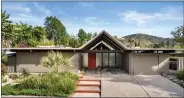  ?? ?? The 1,986-square-foot, midcentury modern house in Orange is the most expensive Joseph Eichler house in Southern California. It fetched $1.85 million.
