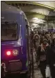  ??  ?? Commuters arrive at Gare Montparnas­se