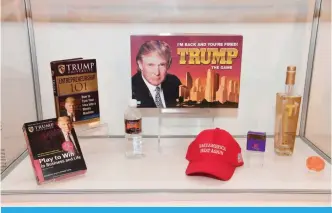  ??  ?? Donald Trump games, books, water, alcohol and other items are displayed.