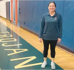  ?? ?? Coach Christie Madancy took over the girls basketball program at Lyman Hall-Wallingfor­d, where her father won two state titles in the 1980s, at a low point in the program’s history. The Trojans turned things around and are headed to the CIAC Class L tournament.