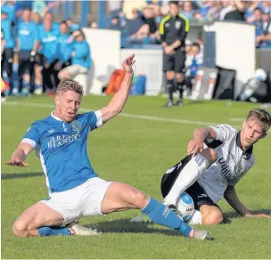  ?? Conor Molloy ?? ●● Jack Mackreth is fouled against Eastleigh