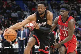  ?? CHRIS GRAYTHEN / GETTY IMAGES ?? Dwyane Wade of the Miami Heat (left), a 12-time All-Star, announced he will retire at the end of the season.