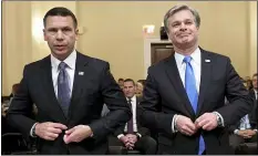  ?? SUSAN WALSH — THE ASSOCIATED PRESS ?? Acting Homeland Security Secretary Kevin McAleenan, left, and FBI Director Christophe­r Wray, right, prepare to testify before the House Homeland Security Committee on Capitol Hill in Washington, Wednesday during a hearing on domestic terrorism.