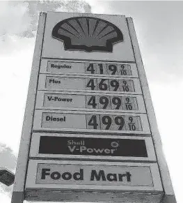  ?? ALEXIA FODERE Herald file ?? Shell gasoline station on North Miami Avenue and 82nd Street on March 9. Gas prices hit yet another record high Tuesday.