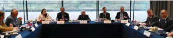  ?? — AFP ?? Yellen (centre) attending a roundtable with business leaders in southern Chinese city of Guangzhou, China. photo