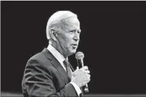  ??  ?? Former Vice President Joe Biden speaks at the Iowa Democratic Party’s fundraisin­g dinner in Des Moines. It drew more than 13,000 people.