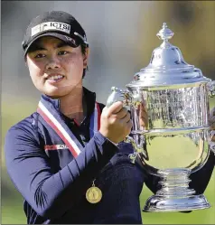  ?? JED JACOBSOHN/AP 2021 ?? Yuka Saso won last year’s U.S. Women’s Open at The Olympic Club. Saso earned slightly more than the typical 18% of the $5.5 million purse, with the USGA wanting to provide the biggest payoff at $1 million.