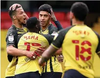  ??  ?? Watford stars thank goal hero Masina