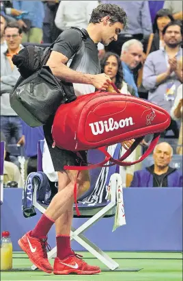  ?? AFP ?? Roger Federer walks off after losing to Juan Martin del Potro on Wednesday. Del Potro next faces Nadal in the semis.