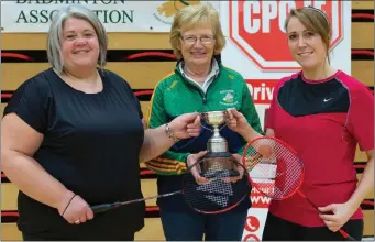  ??  ?? Danielle Noonan, left, and Michelle Horan, Ballybunio­n, being presented with the Tom & Eileen Roache Cup by Eileen Roache, after they won the Division 5 Ladies Doubles Cup at the Kerry Ladies CPC.ie sponsored Doubles Badminton Championsh­ips in Killarney Sports & Leisure Centre last Friday