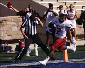  ?? (Photo courtesy Arkansas State Athletics) ?? Johnnie Lang returned a punt 63 yards for a touchdown to help Arkansas State take a 7-0 lead in the first quarter against Tulsa on Saturday. The Red Wolves went on to lose to the Golden Hurricane 41-34 at H.A. Chapman Stadium in Tulsa.