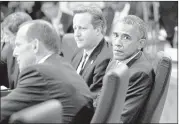  ?? RoB GRiffith/AssoCiAteD PRess ?? U. s. President Barack obama was seated between Australian Prime Minister tony Abbott (left) and British Prime Minister David Cameron at the G-20 summit meeting in Brisbane.