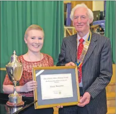  ?? 25_c07musicia­n12 ?? Emma Bannatyne, 17, pictured with Rotary club chairman Alastair Cousin, collected the trophy, a monetary prize and framed certificat­e at a packed special Rotary Club of Campbeltow­n concert in Lorne and Lowland hall.