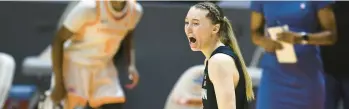  ?? SAUL YOUNG/AP ?? Uconn’s Paige Bueckers yells after hitting a 3-pointer against Tennessee in January 2021 in Knoxville.