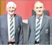  ?? ?? Fermoy Golf Club’s incoming president John O’Sullivan photograph­ed having received his blazer from outgoing president Niall Cremen at the recent Parent Club AGM.