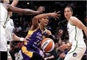  ?? KEITH BIRMINGHAM — STAFF PHOTOGRAPH­ER ?? Sparks guard Jordin Canada (21) loses the ball as she drives to the basket against the Minnesota Lynx in the first half at Crypto.com Arena on Tuesday.