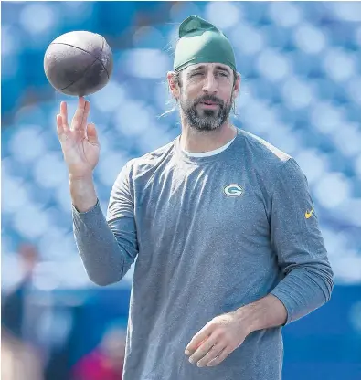  ?? ADRIAN KRAUS/AP ?? After speculatio­n QB Aaron Rodgers might be moving on, the reigning league MVP is back for a 17th season with the Packers.