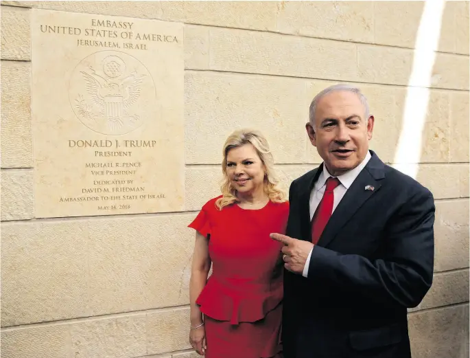  ?? SEBASTIAN SCHEINER / THE ASSOCIATED PRESS ?? Israeli Prime Minister Benjamin Netanyahu and his wife Sara attend the opening ceremony of the new U.S. Embassy in Jerusalem on Monday.