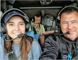  ??  ?? TURTLE IN TRANSIT: Pilot Kelsey Yelseth, left, safety pilot Darren Hanner and Kelsey’s mother Coral in the back crewed Hanner’s plane for the rescue flight transferri­ng Myrtle the turtle from EL to PE.