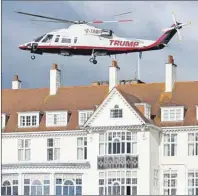  ?? AP PHOTO ?? A helicopter owned by Donald Trump departs from the Turnberry golf course in Turnberry, Scotland, Wednesday.