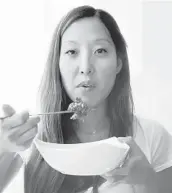  ?? GEOFF MARTIN PHOTOGRAPH­Y ?? Attorney and cookbook author Joanne Lee Molinaro — better known as the Korean Vegan — looks forward to returning to Italy.