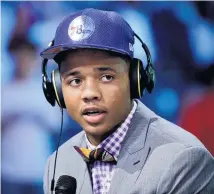  ?? Picture / AP ?? The Process is in the hands of guard Markelle Fultz.