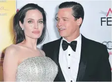  ??  ?? Angelina Jolie y Brad Pitt en una de sus últimas imágenes como esposos.