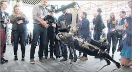  ?? Glenn Chapman AFP/Getty Images ?? SOFTBANK, a global tech firm that has dabbled in robotics, bought Boston Dynamics from Google for an undisclose­d sum. Above, a Boston Dynamics robot.