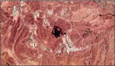  ?? (AP) ?? This June 26, 2020 photo from the European Commission’s Sentinel-2 satellite shows the site of an explosion that rattled Iran’s capital. Analysts say the blast came from an area in Tehran’s eastern mountains where they hid a undergroun­d tunnel system and missile production sites. The explosion appears to have
charred hundreds of meters of scrubland.