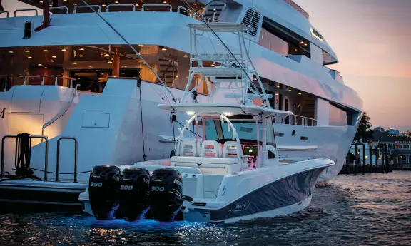  ??  ?? A well-appointed center console (above) opens up a host of options for owners and their guests, including fishing, diving or just sightseein­g. The 148-foot Newcastle Carson serves as the mothership for the 86-foot Merritt Bree (left). Both are familiar...