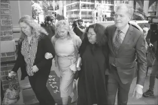  ?? RICK RYCROFT/AP ?? STEVE JOHNSON (RIGHT) with his sisters, Terry (left) and Rebecca and his wife Rosemarie (second right) arrive at the Supreme Court in Sydney on Monday for a sentencing hearing in the murder of Scott Johnson, Steve, Terry and Rebecca’s brother.