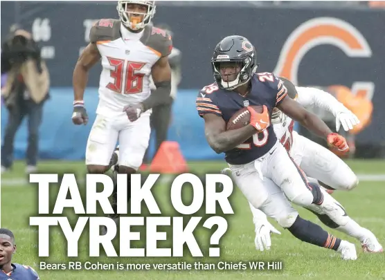  ?? NAM Y. HUH/AP, JOE ROBBINS/GETTY IMAGES (INSET) ?? Bears second-year running back Tarik Cohen (left and above) is averaging 12.1 yards per catch, second on the team to tight end Trey Burton’s 16. He also is averaging 5.1 yards per rush. Cohen had a team-high 121 receiving yards Sunday against the Buccaneers.