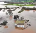  ?? Justin Sullivan Getty Images ?? SALINAS River f looding in January.