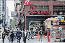  ?? MARK LENNIHAN THE ASSOCIATED PRESS ?? Chick-fil-A, the controvers­ial American fast food company, said Wednesday that it will open its first Canadian restaurant in Toronto.