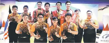  ??  ?? Boys Team winners posing with their medals after the prize presentati­on.