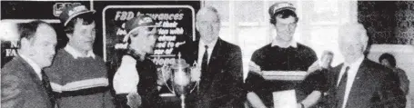  ?? ?? Eddie Collins TD Minister of State for Industry and Commerce presenting the award to John Kenny, captain of the Ballyduff team that won the Farm Tasks at the RDS, Spring Show in 1986. Also included are team members Liam and Richard Keane and Thomas Shanahan (left), national president, Macra and Paddy O’Keeffe, editor, Irish Farmers Journal.