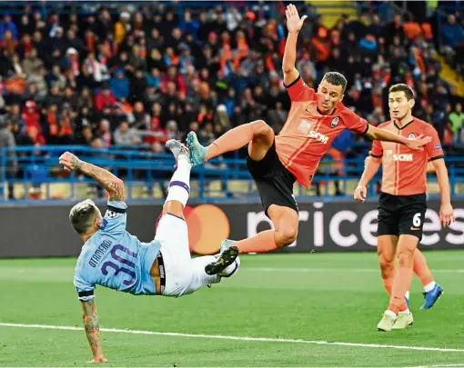 ??  ?? Fancy footwork: Manchester City’s Nicolas Otamendi (left) and Shakhtar Donetsk’s Junior Moraes clash during the Champions League Group Cmatchin Kharkiv on Wednesday. — AFP