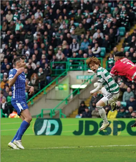  ?? ?? Kyogo Furuhashi opens the scoring for Celtic with a header before the break, then turned provider for Celtic’s second goal