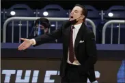  ?? MICHAEL CONROY - STAFF, AP ?? Iona head coach Rick Pitino gestures as his team plays against Alabama in the first half of Saturday’s game at Hinkle Fieldhouse in Indianapol­is.