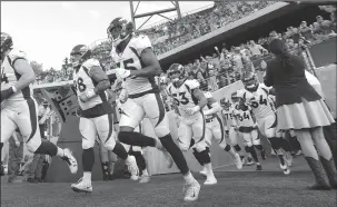  ?? RAY STEWART/CANTONREP.COM ?? The Denver Broncos take the field for the 2019 Pro Football Hall of Fame Game on Thursday in Canton, Ohio.