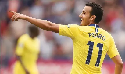  ?? Picture: AFP ?? KILLER BLOW. Chelsea’s Pedro celebrates after scoring in their English Premier League opener against Huddersfie­ld at the John Smith’s Stadium on Saturday.