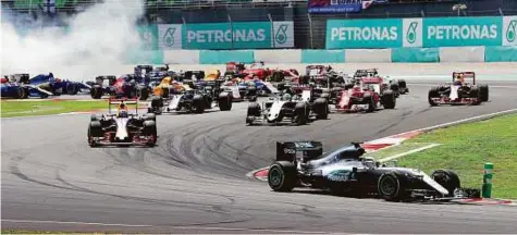  ?? Rex Features ?? Lewis Hamilton of Mercedes leads Daniel Ricciardo of Red Bull and Sergio Perez of Force India at the start of the Malaysian F1 Grand Prix at Sepang Internatio­nal Circuit last month. Officials are to meet this week to discuss the future of the Malaysian GP.