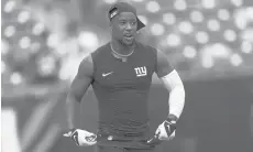  ?? ADAM HUNGER/AP ?? Giants running back Saquon Barkley warms up before a preseason game Aug. 29 in East Rutherford, N.J.