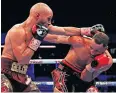  ??  ?? Battle: American Caleb Truax defends as James DeGale tries to mount an attack