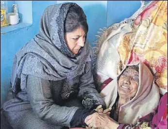  ?? HT PHOTO ?? Former J&amp;K chief minister Mehbooba Mufti during a visit to a militant’s family in Shopian district on Thursday.