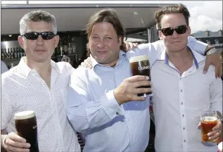  ??  ?? Noel Denver, Brian Holland and Alan Chambers at the Martello’s rooftop Sky Bar.