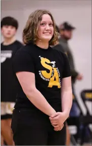  ?? ?? South Adams swim star Maggie Nussbaum, a two-time state finalist in the 500 Free for the Starfish, was recently recognized for her success at halftime of the basketball game.