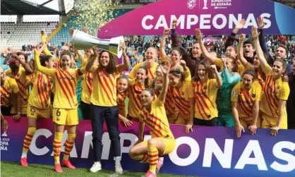  ??  ?? Barcelona celebrate winning the first women’s Supercopa final. Photograph: JM Garcia/EPA