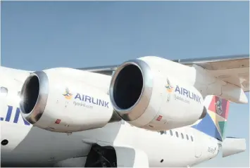  ?? KAREN SANDISON ?? AN AIRLINK plane is parked on the OR Tambo Internatio­nal Airport tarmac. |
African News Agency (ANA)
